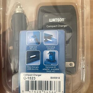 One black Watson ADC compact charger.